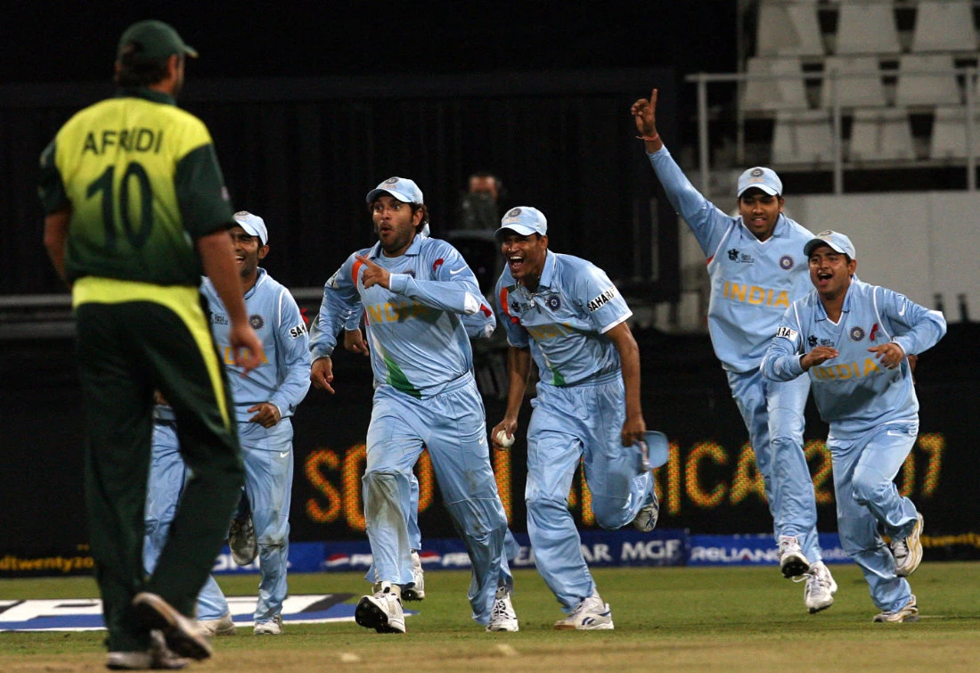 Pakistani cricket player Shahid Afridi leaves the ground after missing the stumps as Indian players celebrate their victory against Pakistan at the Twenty20 world championships match at the Kingsmead Cricket Stadium in Durban. (AFP/File)