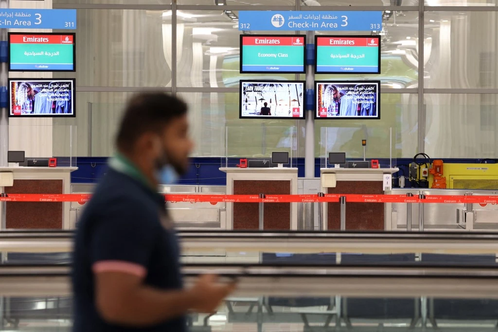 People attending the FIFA World Cup Qatar 2022 will be able to enter the UAE multiple times through the ‘Hayya’ visa program. (File/AFP)