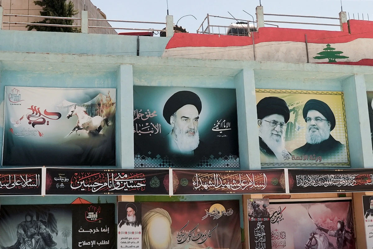 Hezbollah and its patron in Tehran use the same technique: twisting arms and threats of chaos. (Reuters photo)