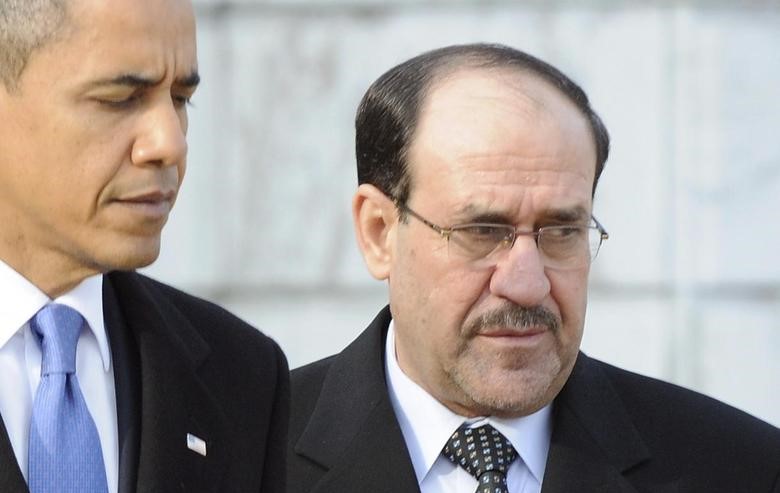 Barack Obama and Nuri Al-Maliki at Arlington National Cemetery, Arlington, Virginia, Dec. 12, 2011. (Reuters)