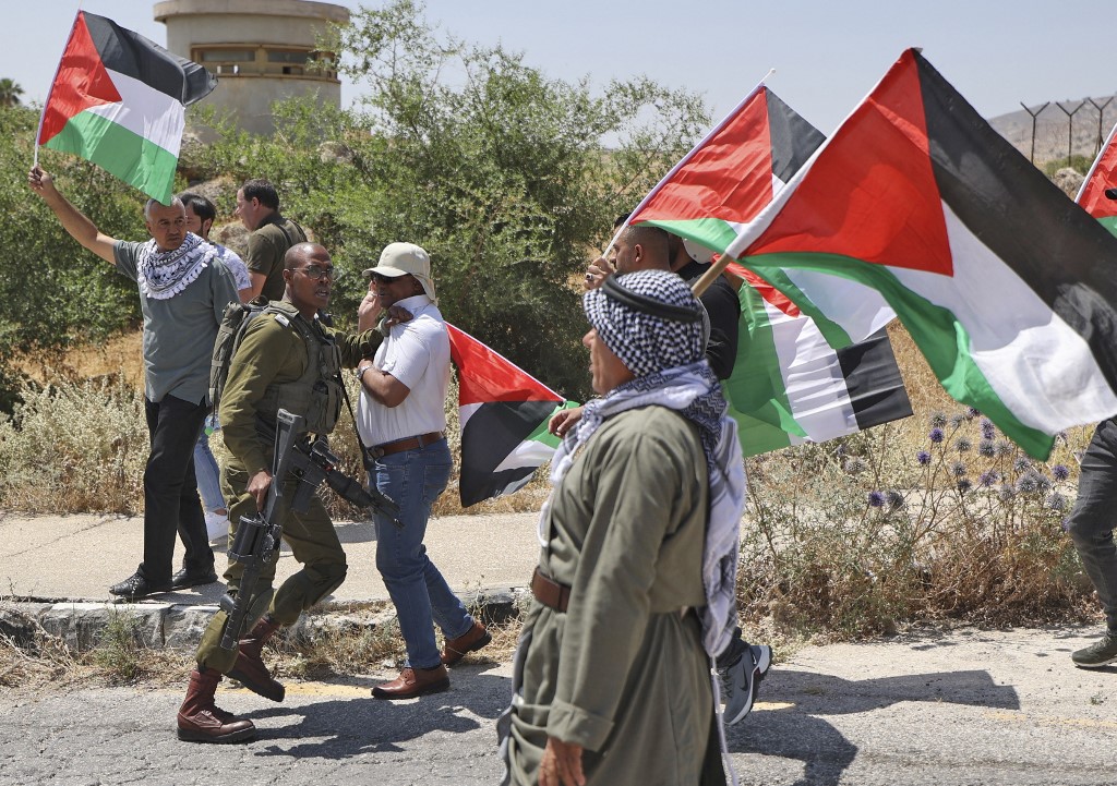 Israel’s constant expansion of Jewish settlements all amounts to a mass violation of Palestinians’ rights. (AFP)