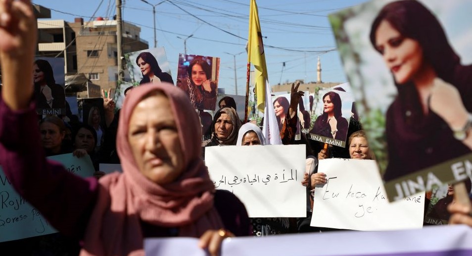 Women protest the death of 22-year-old Kurdish woman Mahsa Amini in Iran, Qamishli, Syria, Sept. 26, 2022. (Reuters)