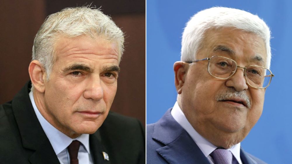 Israeli Prime Minister Yair Lapid and Palestinian Authority President Mahmoud Abbas. (AFP/Getty Images)