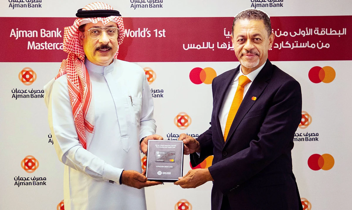 Khalid Elgibali, division president, Middle East and North Africa, Mastercard, and Mohamed Amiri, chief executive, Ajman Bank.