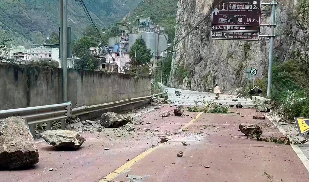 Fallen rocks are seen on a road near Lengqi Town in Luding County of southwest China's Sichuan Province Monday, Sept. 5, 2022. (AP)