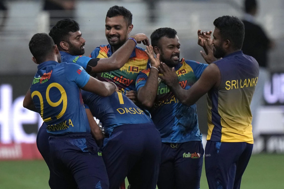 Sri Lankan players celebrate after their win in the T20 cricket match of Asia Cup against India, in Dubai, on Tuesday. (AP)
