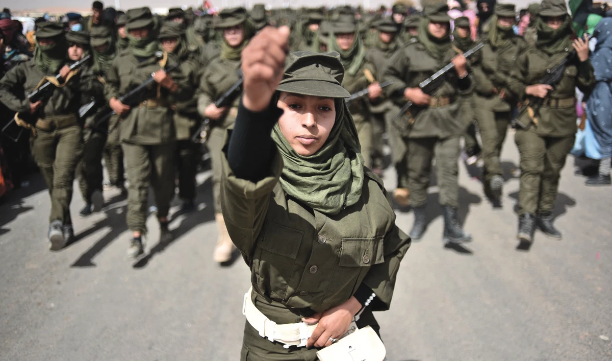 Sahrawi soldiers parade during the celebrations marking the 45th anniversary of the declaration of the Sahrawi Arab Democratic Republic at a refugee camp on the outskirts of the southwestern Algerian city of Tindouf on Feb. 27, 2021. (AFP)