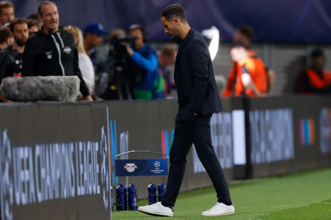 RB Leipzig’s Italian-German head coach Domenico Tedesco leaves after their UEFA Champions League match against FC Shakhtar Donetsk in Leipzig on Tuesday. (AFP)
