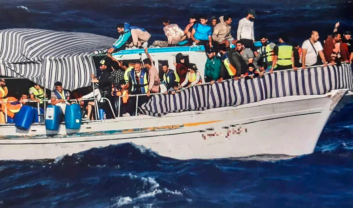 Migrants on a boat during a search and rescue operation off Karpathos island. (AFP/File)