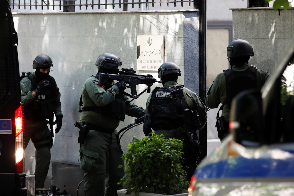 Members of Albania’s police special unit enter the Iranian embassy on Sept. 8, 2022. (Reuters)