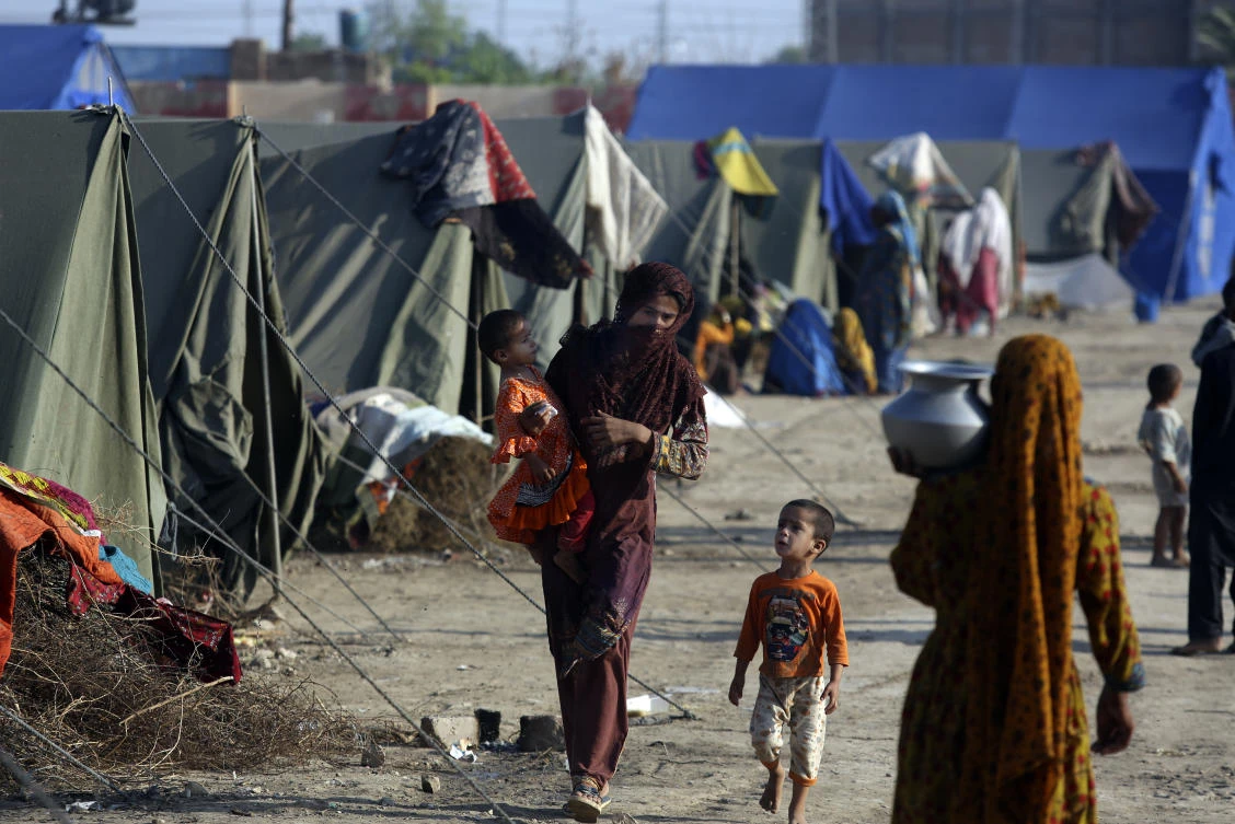 Victims of heavy flooding from monsoon rains take refuge at a temporary tent housing camp organized by the UN Refugee Agency (UNHCR), in Sukkur, Pakistan, Saturday, Sept. 10, 2022. (AP)