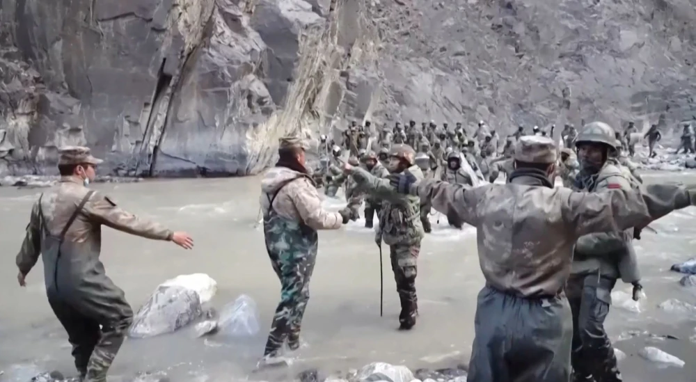 Chinese (foreground) and Indian soldiers (R, background) during an incident where troops from both countries clashed in the Line of Actual Control in the Galwan Valley, in the Himalayas.(AFP file photo)