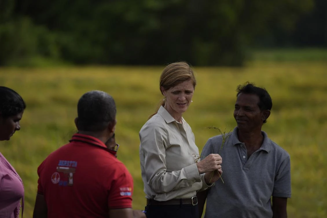 USAID administrator Samantha Power speaks with rice farmers during a visit to a paddy field in Ja-Ela on the outskirts of Colombo, Sri Lanka. (AP)