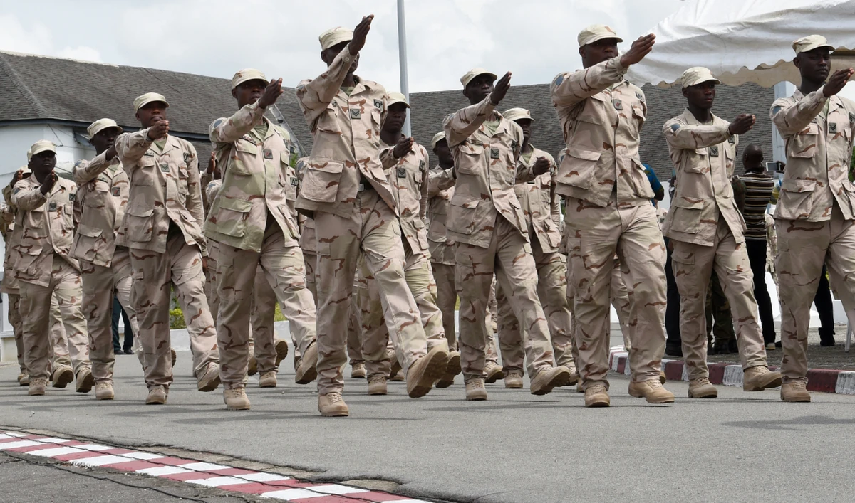 Soldiers of an Ivory Coast combat unit heading to Mali march during a ceremony in Abidjan ahead of their departure on May 3, 2017. (AFP/File)