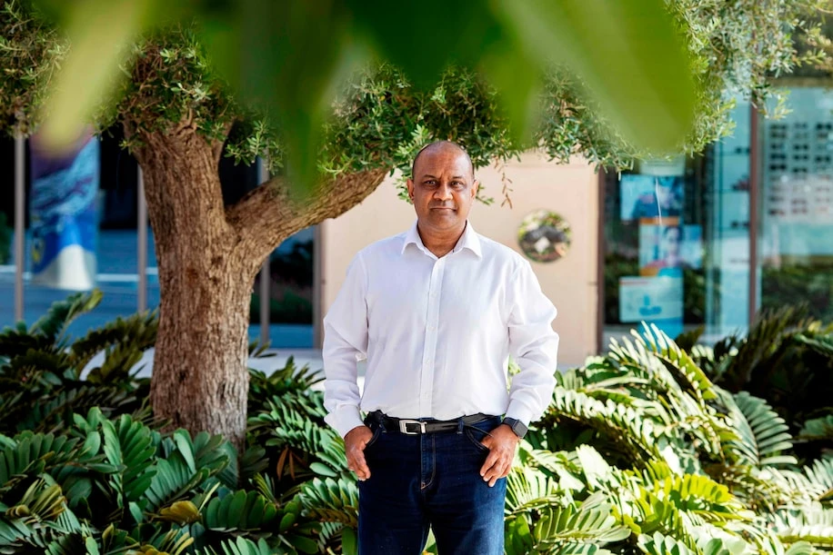 Sanjay Shah poses for a photograph on the Palm Jumeriah Island in Dubai, United Arab Emirates, on September 29, 2020. (AP/File)