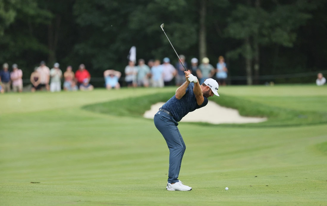 Dustin Johnson of the US hits his second shot on the 16th hole during the final round of the LIV Golf Invitational - Boston. (AFP file photo)