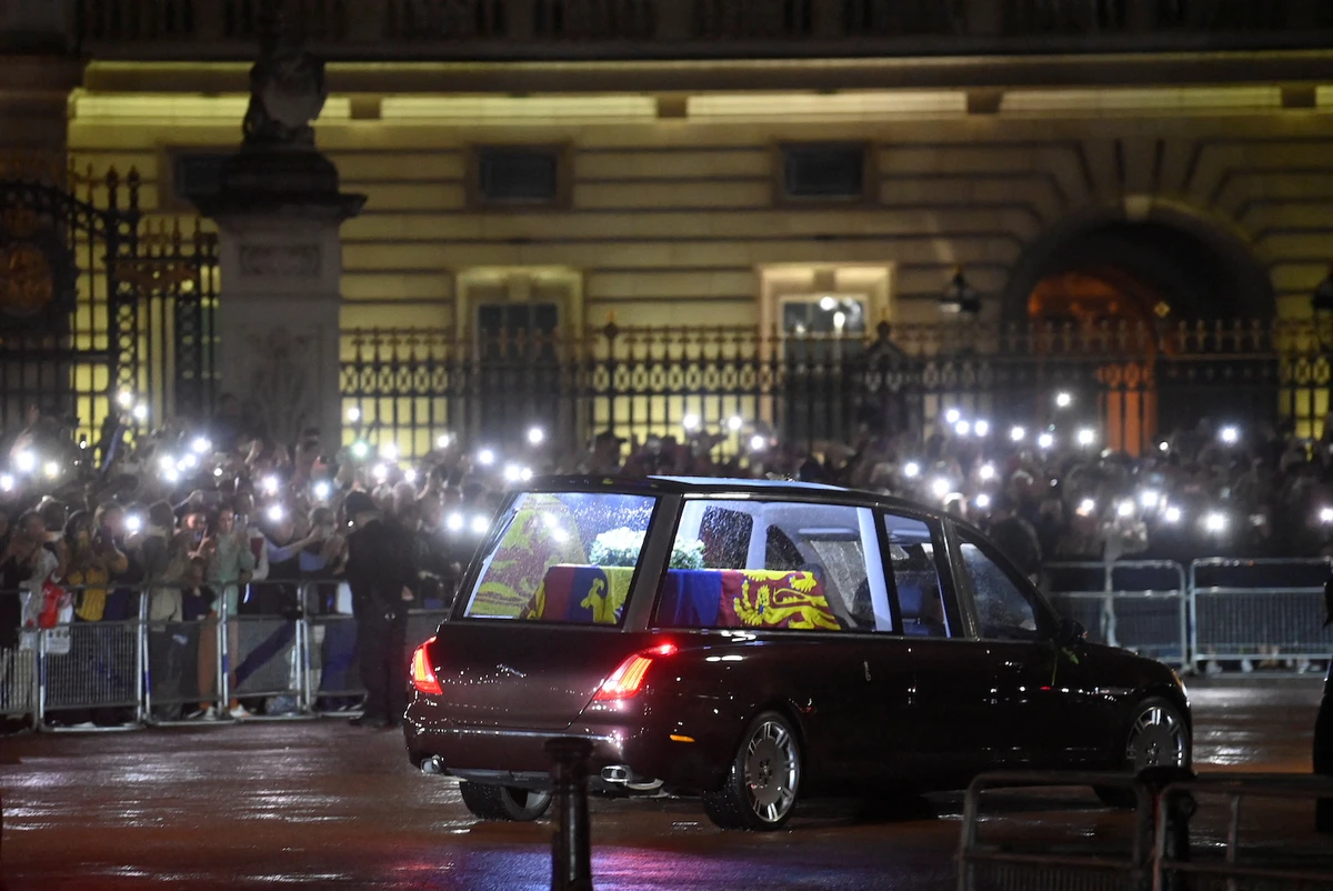 The hearse carrying the coffin of Britain's Queen Elizabeth arrives at the Buckingham Palace, following her death, in London, Britain September 13, 2022. (Reuters)