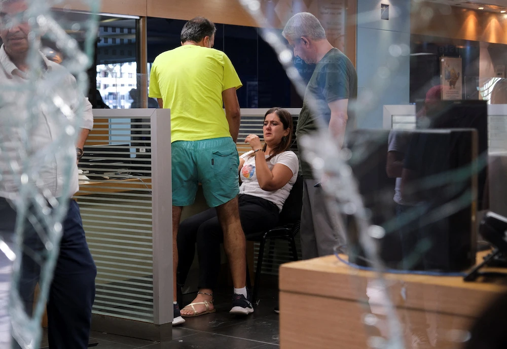 Woman armed with toy gun forces Beirut bank to hand over $13,000 of her withheld savings