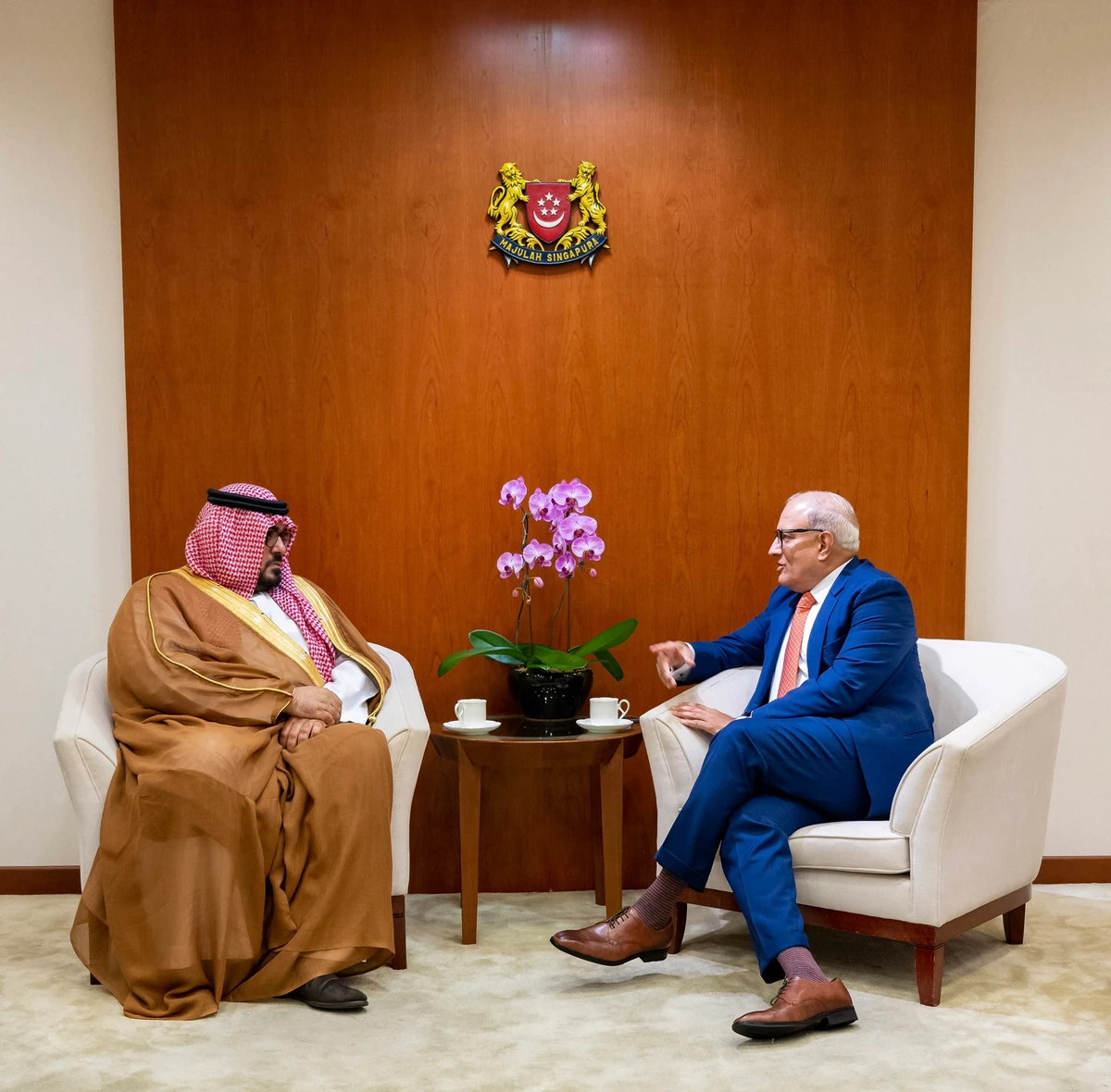 Saudi Minister of Economy and Planning Faisal Al-Ibrahim meets Singapore’s Minister for Transport S Iswaran. (Twitter/@MEPSaudi)