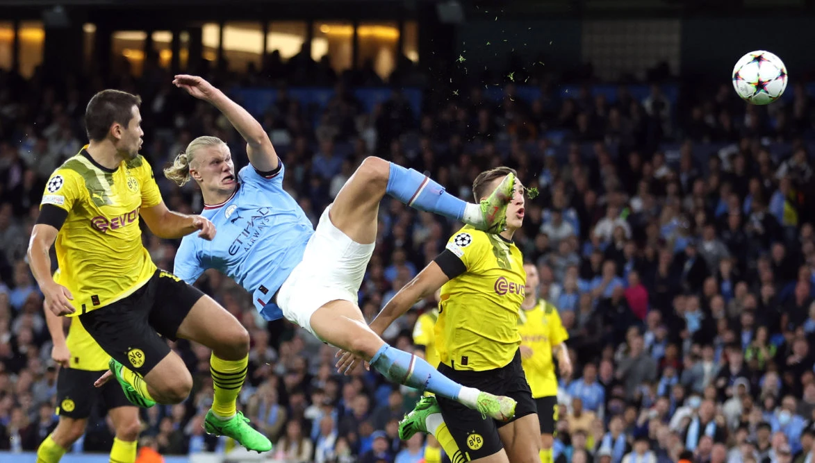 Manchester City's Erling Braut Haaland scores their second goal against Borussia Dortmund in the Champions League Group G match on Tuesday at Etihad Stadium. (Reuters)