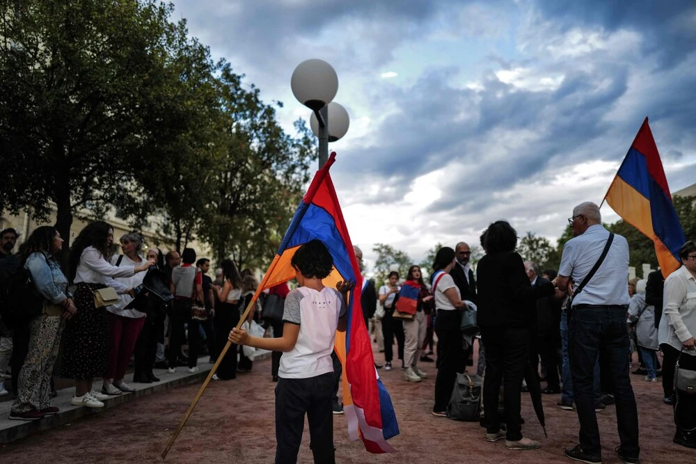 Armenia’s supporters take part in a demonstration rally to protest against Azerbaijan in Lyon, eastern France, on Thursday. (AFP)