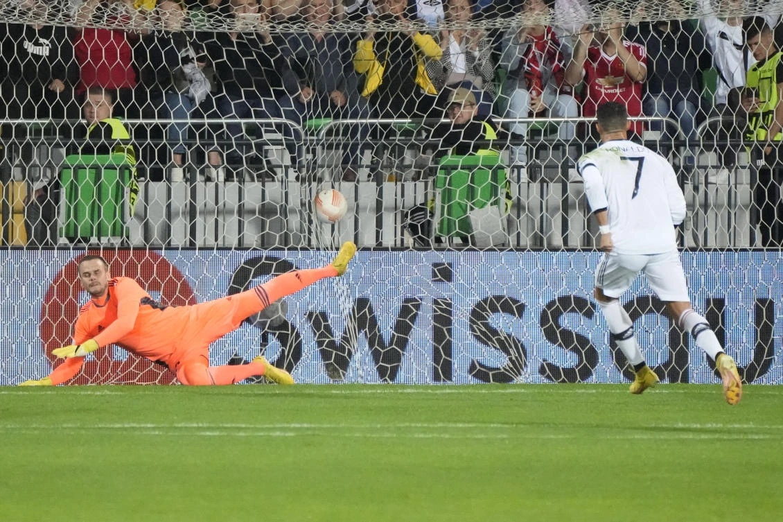Manchester United’s Cristiano Ronaldo celebrates after scoring his side’s second goal on a penalty kick during their Europa League match against Sheriff Tiraspol at the Zimbru stadium, in Chisinau, Moldova, on Thursday. (AP)
