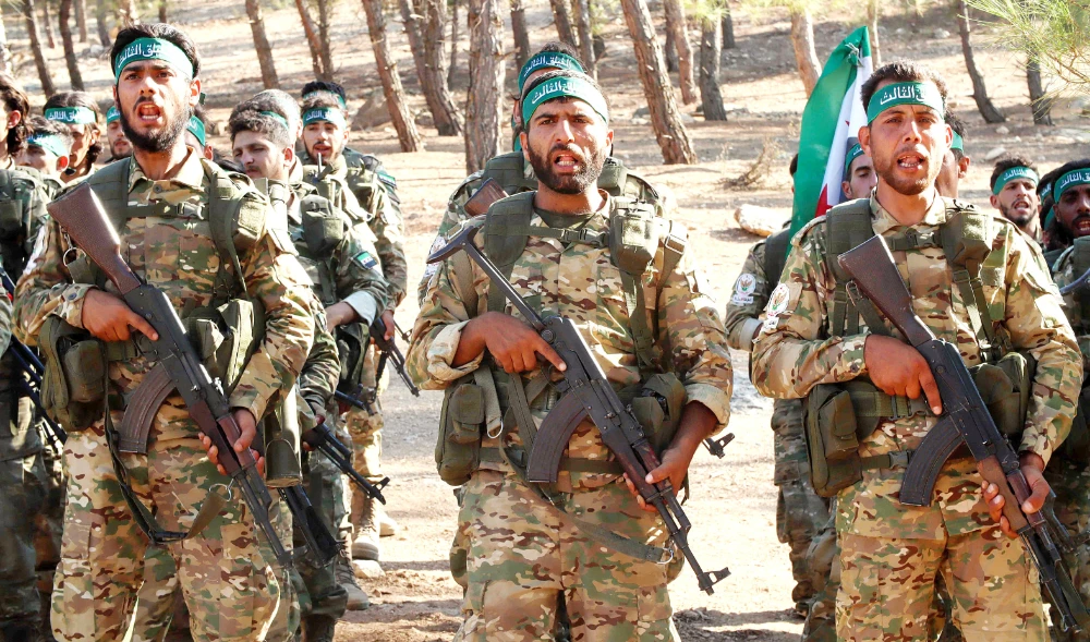 With a Russian nudge, Turkey and Syria  step up contacts