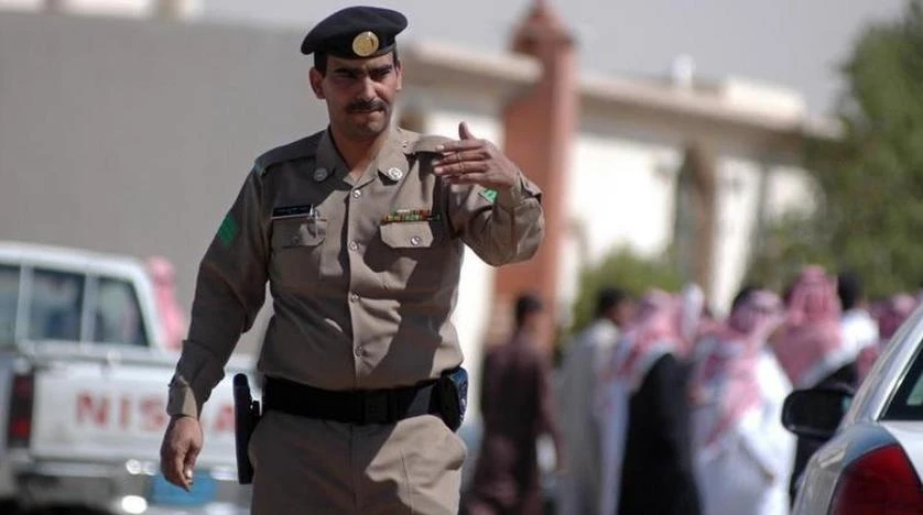 A Saudi policeman directs traffic at a roadblock in eastern Riyadh, Saudi Arabia . (Reuters)