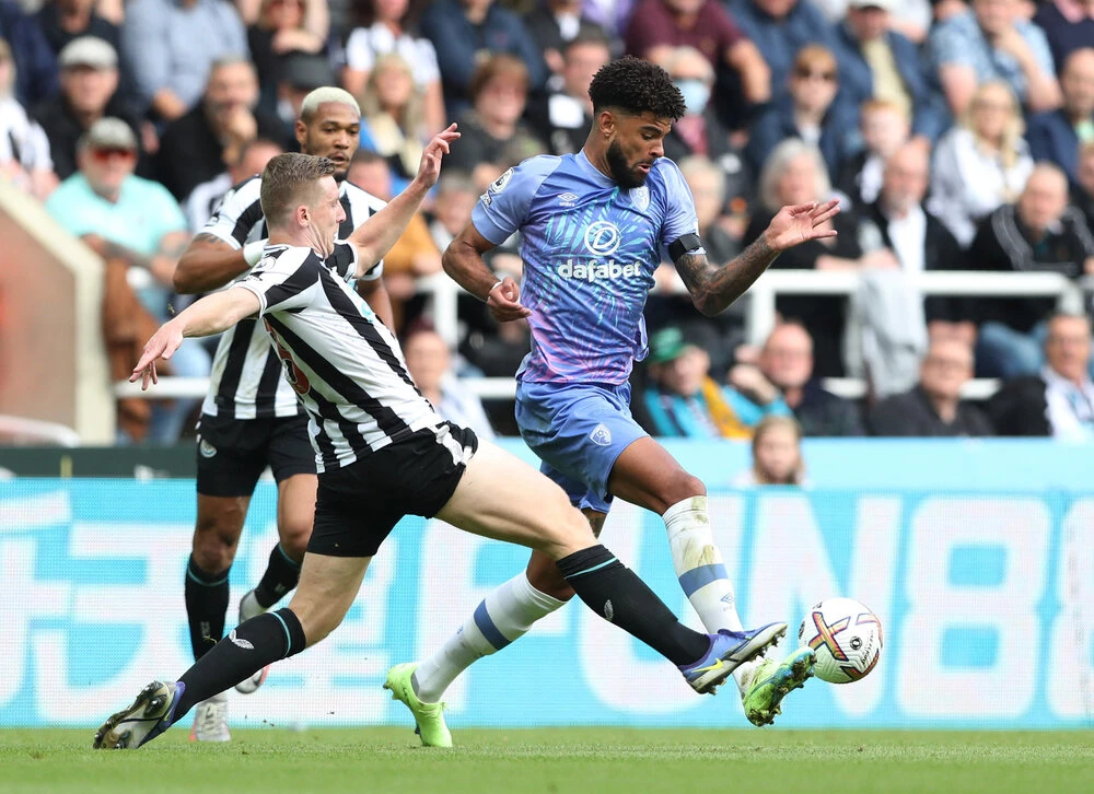 Newcastle United’s Matt Targett in action with AFC Bournemouth’s Philip Billing during their Premier League match at St. James’ Park, Newcastle on Saturday. (Reuters)