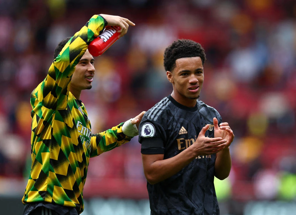 Arsenal’s Ethan Nwaneri with Gabriel Martinelli after the match. (Reuters)
