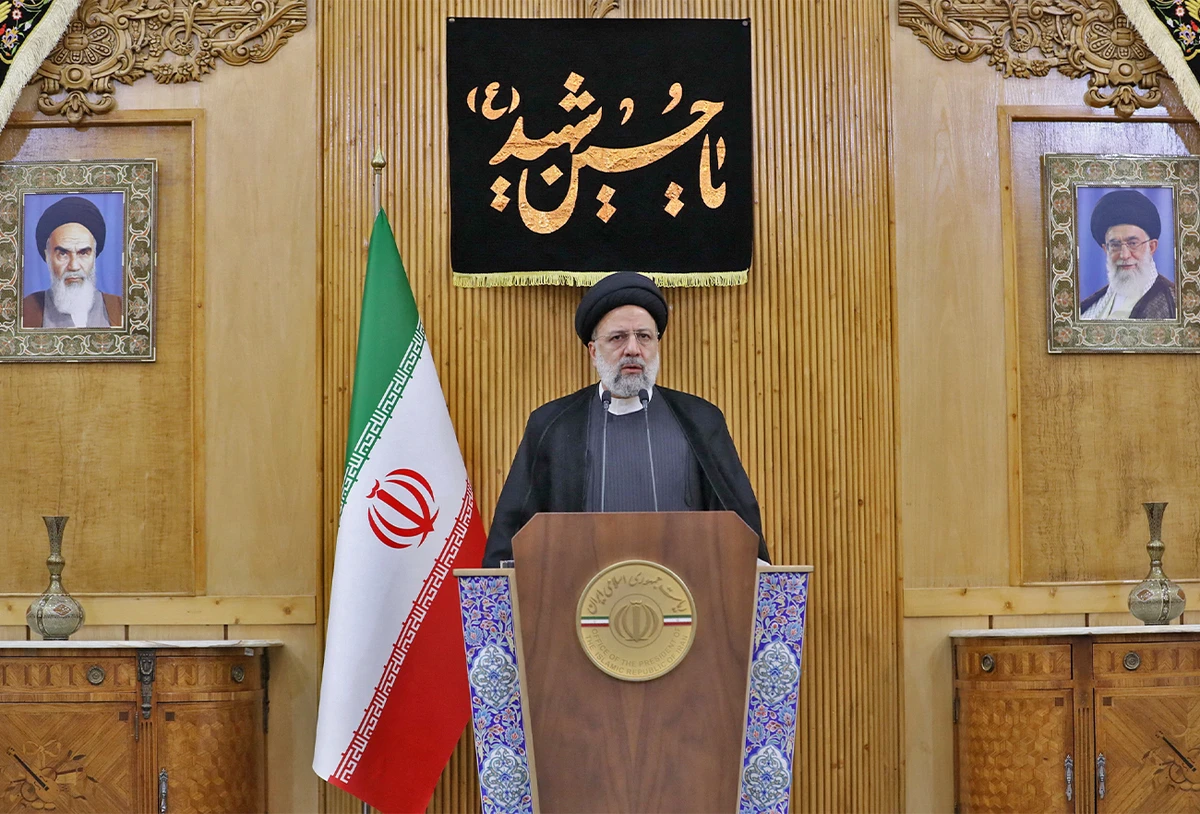 This handout picture provided by the Iranian Presidency shows Iran's President Ebrahim Raisi addressing the media before he departs from the capital Tehran's Mehrabad International Airport on September 19, 2022 to attend the 77th session of the UN General Assembly in New York, US. (AFP)
