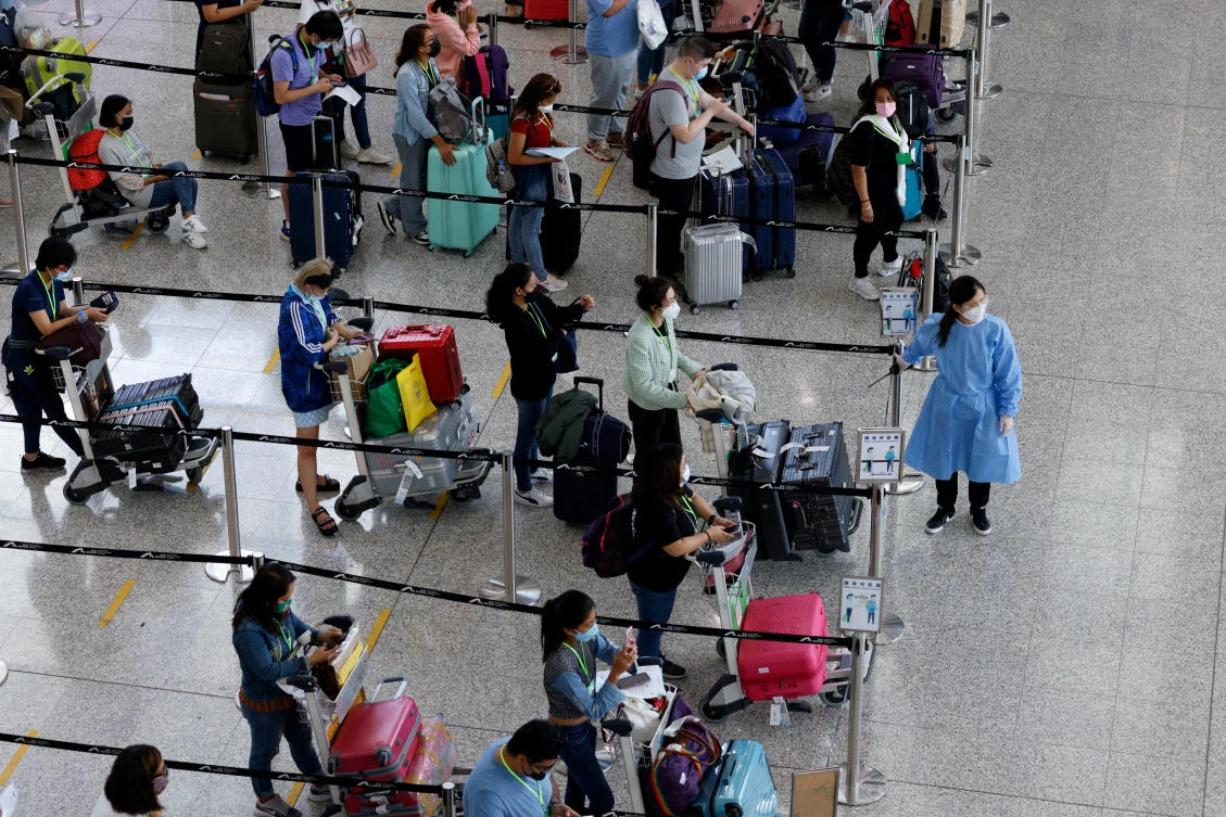 Arrivals at Kong Kong airport, once one of the world’s busiest, are at a fraction of pre-pandemic levels with many airlines skipping the city altogether. (Reuters)
