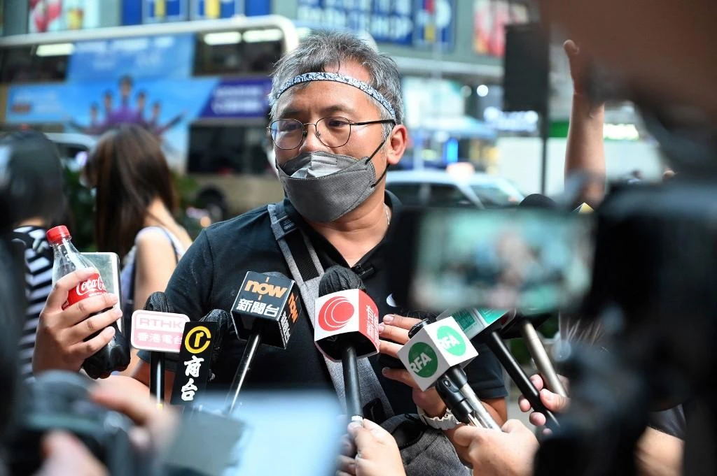 The Hong Kong Journalists Association is one of the last major professional groups in Hong Kong advocating fundamental rights and media freedoms, following the enactment in June 2020 of a controversial national security law by Chinese authorities. (AFP/File)