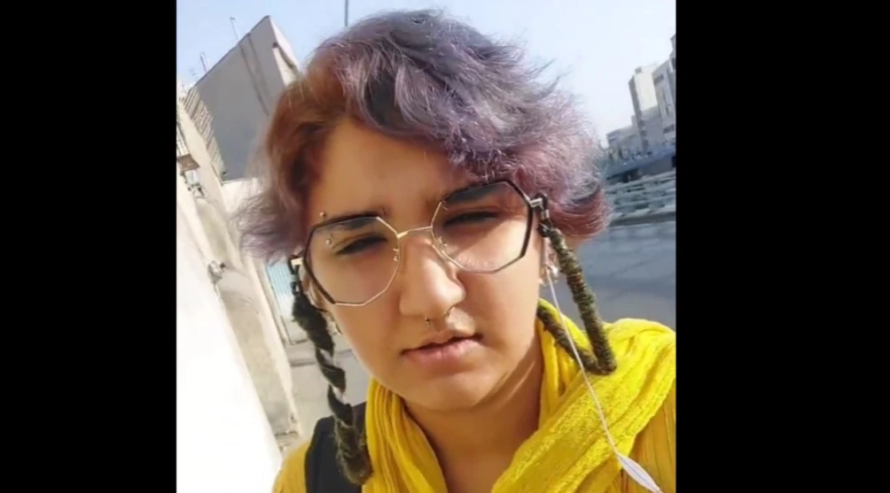 Iranian rights activist Melika Qaragozlu posted a video of herself on social media without the mandatory head covering. (Social media)