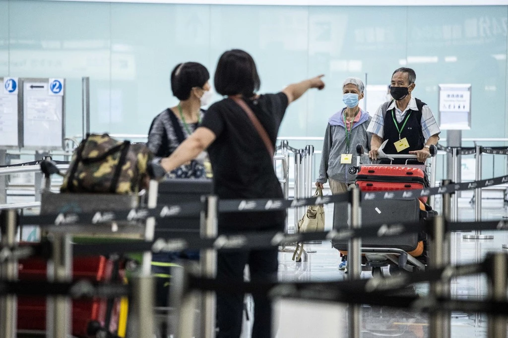 Hong Kong once boasted one of the world’s busiest airports but passenger numbers this year are just 3.8 percent of pre-pandemic levels. (AFP)