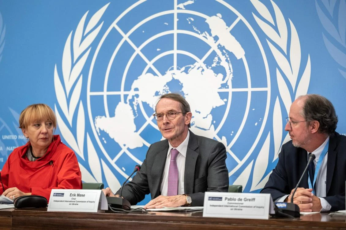 Chair of the Human Rights Expert Members of the Independent International Commission of Inquiry on Ukraine Erik Mose and members attend a news conference following the presentation of their report. (AFP)