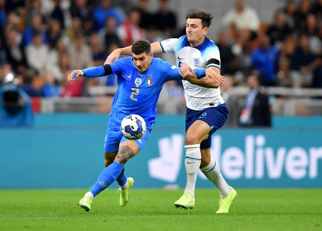 Italy’s Giovanni Di Lorenzo in action with England’s Harry Maguire during their UEFA Nations League match at the San Siro, Milan on Friday. (Reuters)