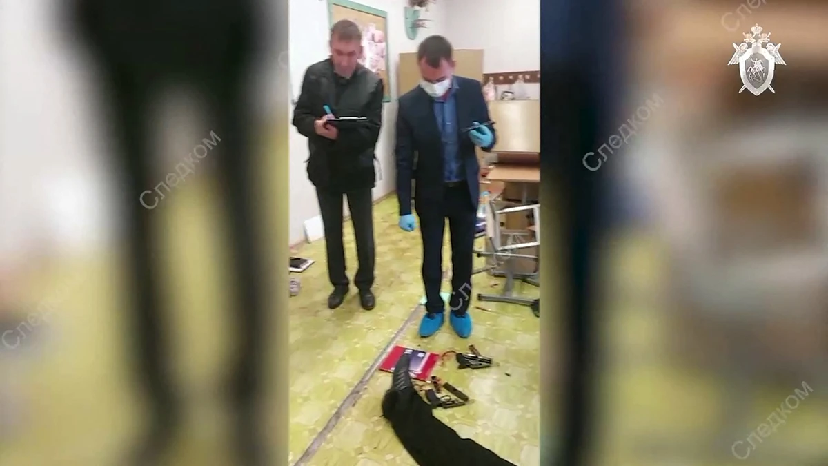 Swastika-wearing ex-pupil kills 15 in Russian school shooting