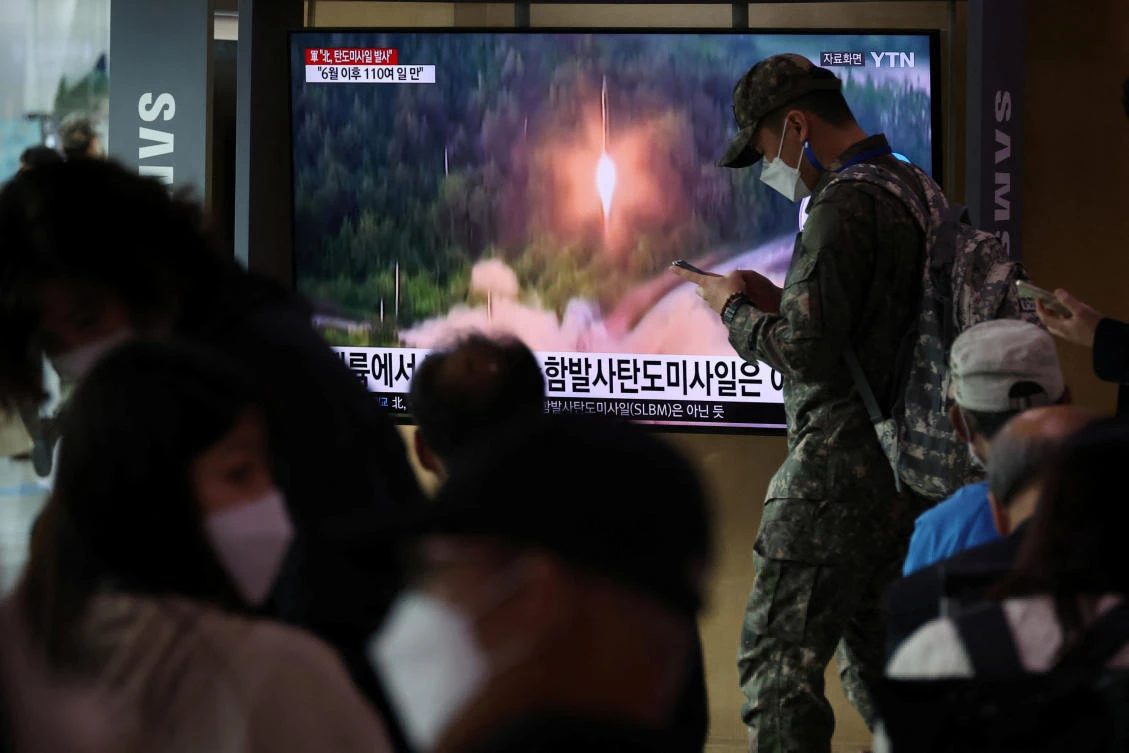 North Korea also fired a ballistic missile toward the sea off its east coast on Sunday. (Reuters)