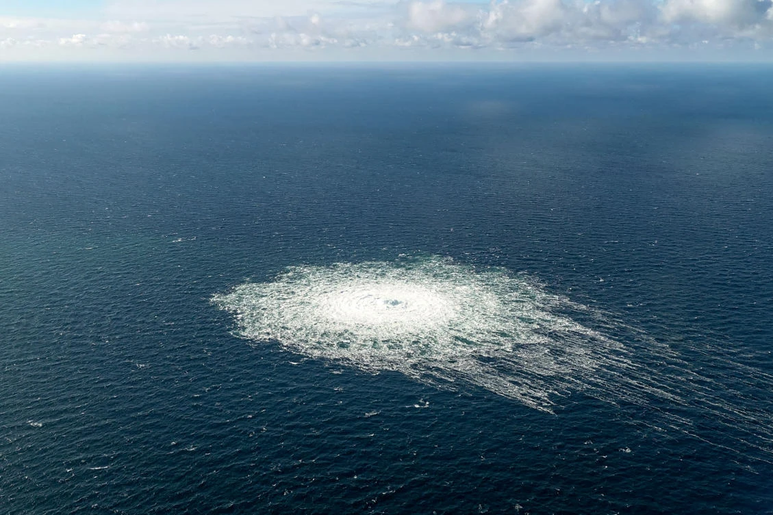 Above, gas leaks at the Nord Stream 2 gas pipeline. (Danish Defense Command via AFP)