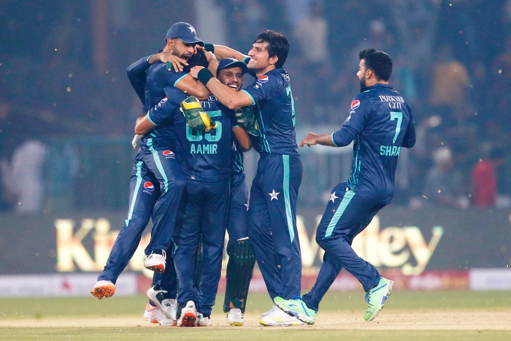 Pakistani players celebrate after winning the fifth twenty20 cricket match against England in Lahore Wednesday. (AP)