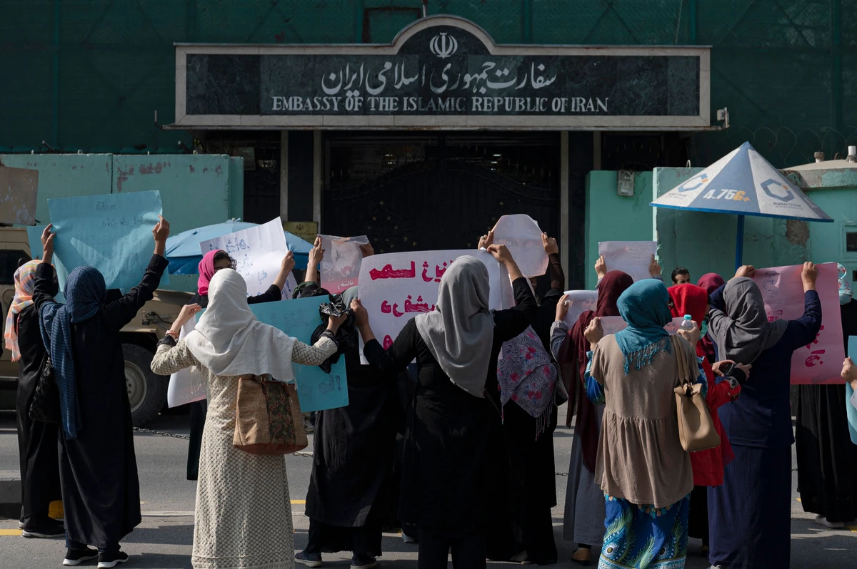 Taliban forces fired shots into the air on Thursday to disperse a women’s rally supporting protests that have erupted in Iran. (AFP)