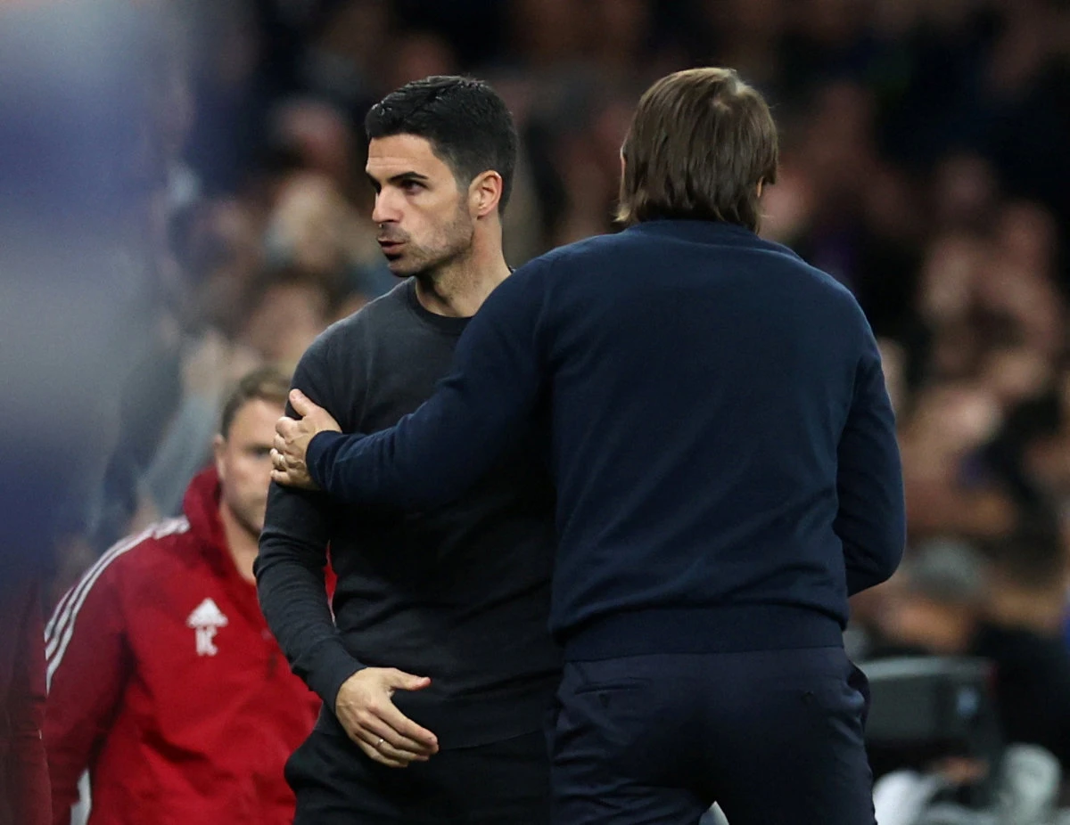 Tottenham Hotspur manager Antonio Conte with Arsenal manager Mikel Arteta after their Premier League match on May 12, 2022. (Reuters file photo)