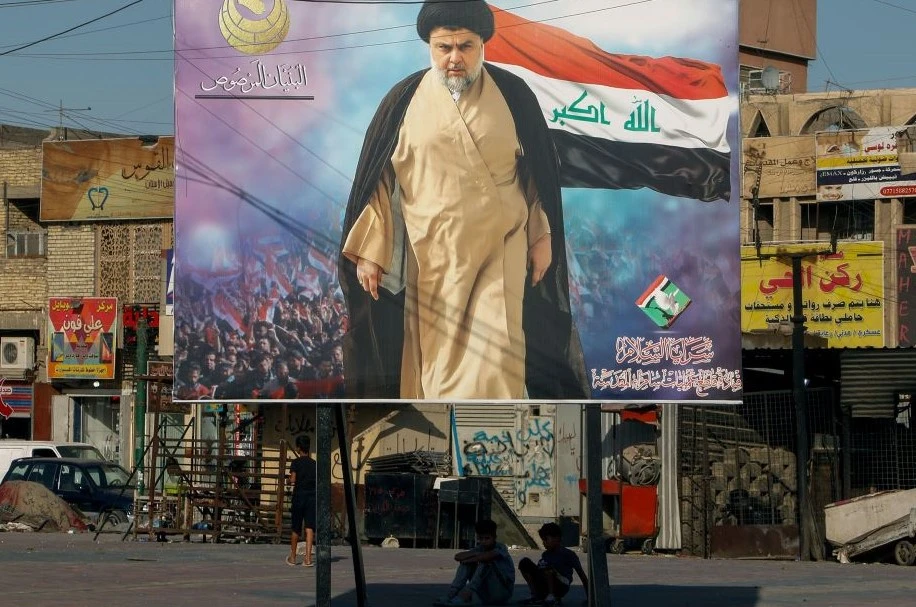 Muqtada Al-Sadr on a billboard in Baghdad’s Sadr City district, a stronghold of his movement, June 21, 2021. (Reuters)