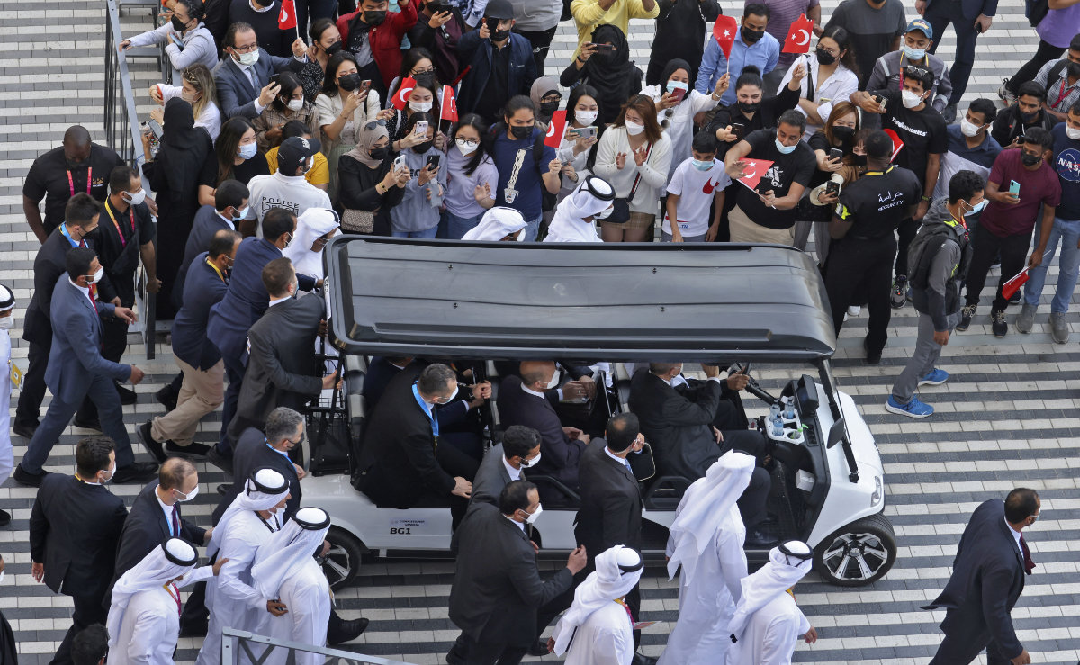 Turkish President Recep Tayyip Erdogan rides in a golf cart at Expo 2020 in Dubai on Feb. 15, 2022. (AFP)