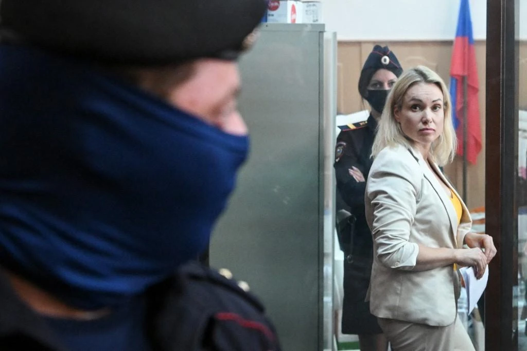 Russian TV protester listed as wanted fugitive