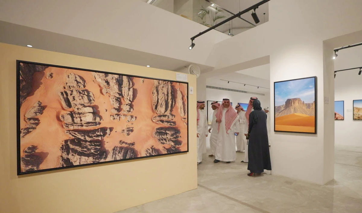 Faisal Bin Zarah's artworks "Otherworld" (left) and "Nufud and Tuwaiq" (right) showcased at Lakum Art Space in his first solo exhibition. (Lakum Art Space/Mohammad Fattal)