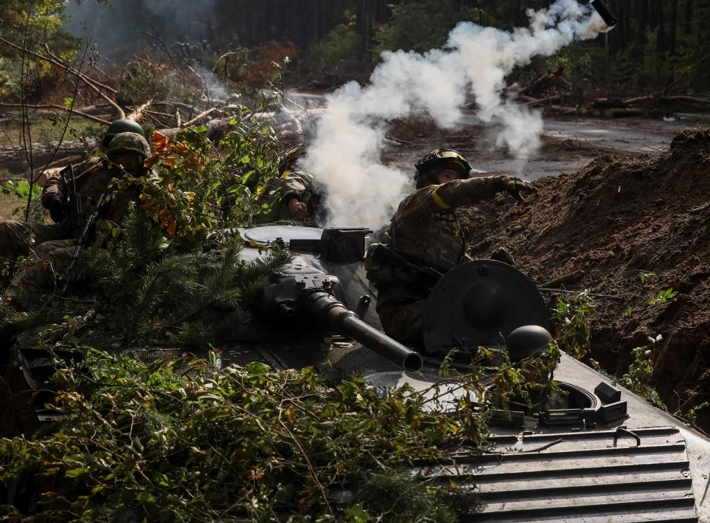 Ukrainian servicemen attend a joint drill of armed forces, national guard and border guard at the border with Belarus, amid Russia’s attack on Ukraine in Chernihiv region, on Sept. 30, 2022. (Reuters)