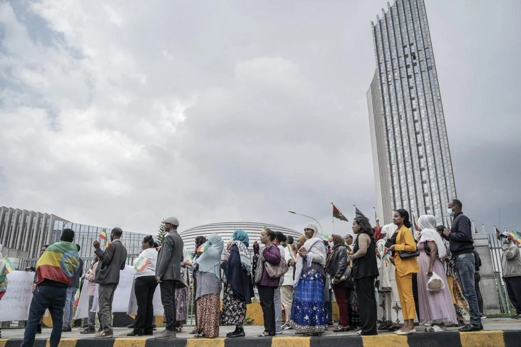Protesters gather at headquarters of African Union in Addis Ababa, Ethiopia to denounce the renewal of the hostilities between government forces and Tigrayan rebels. (AFP)