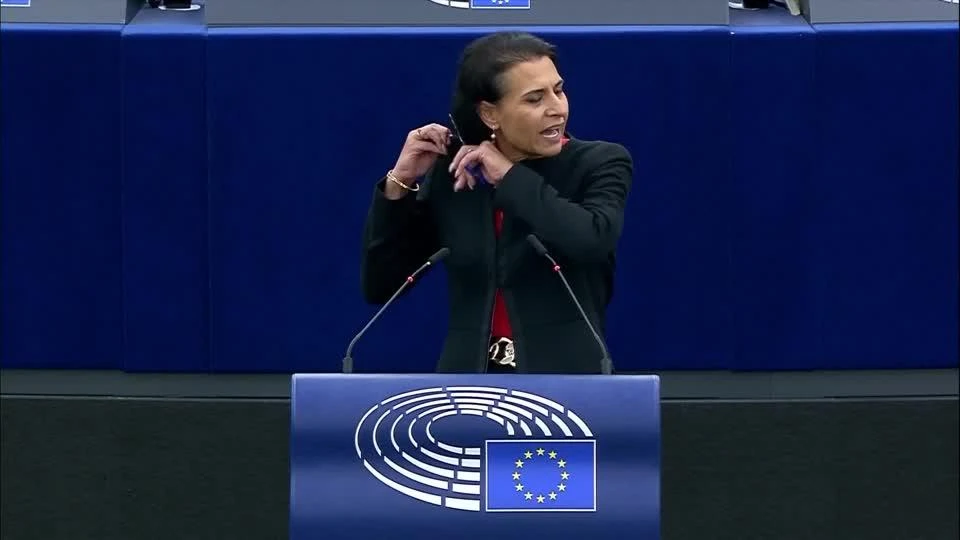 A Swedish member of the European Parliament cut off her hair on Tuesday evening during a speech in the EU assembly in solidarity with anti-government demonstrations in Iran. (Reuters)